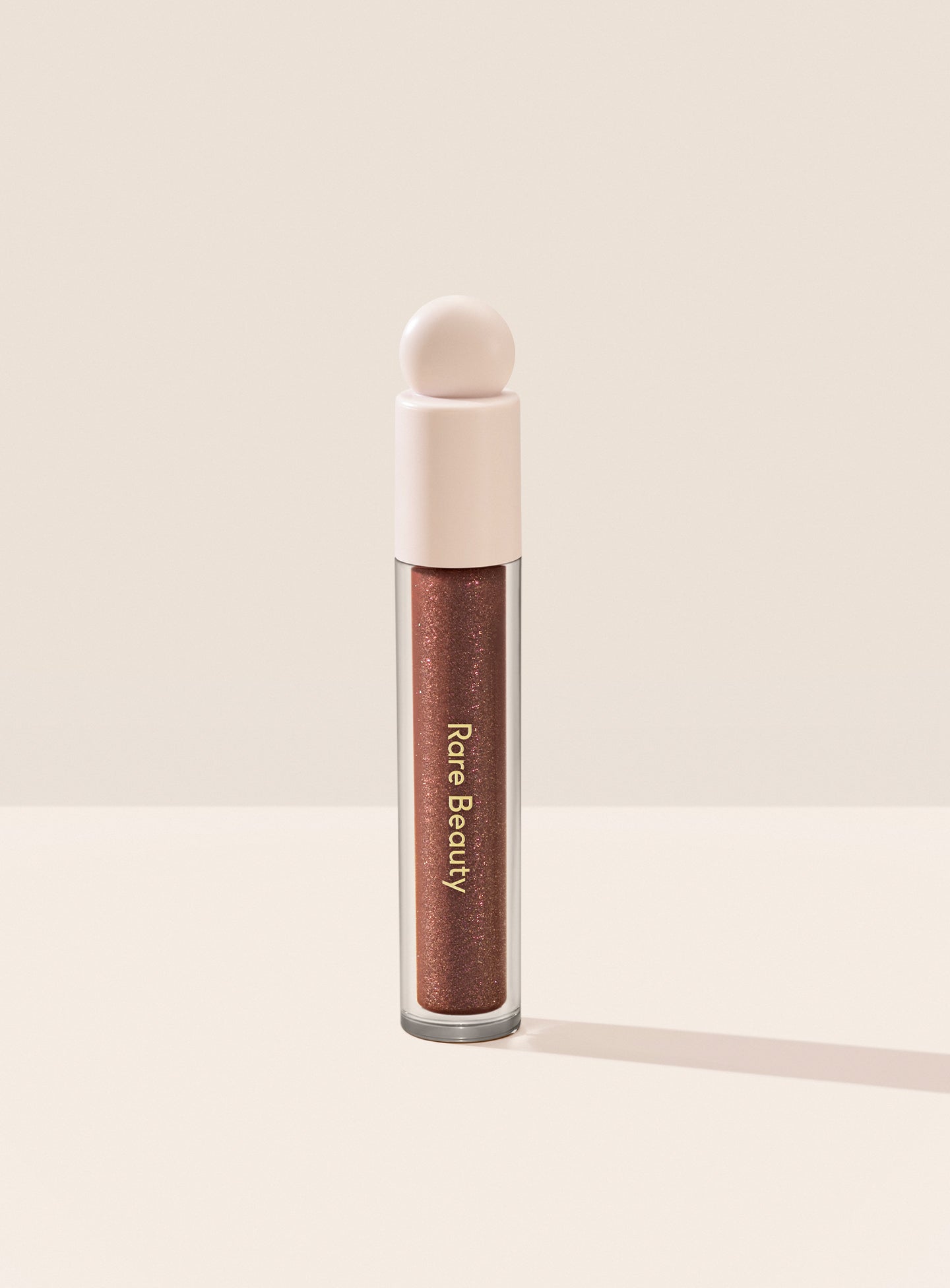 Positive Light Luminizing Lip Gloss by Rare Beauty